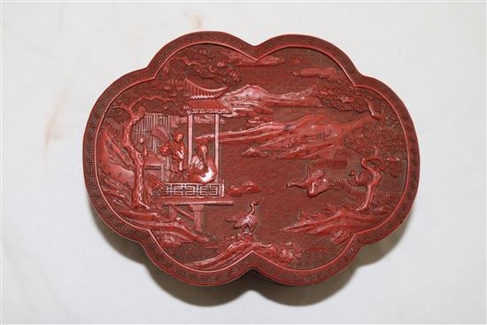 A Chinese cinnabar lacquer sexafoil box and cover, Qianlong / Jiaqing period, width 16.2cm, slight damage